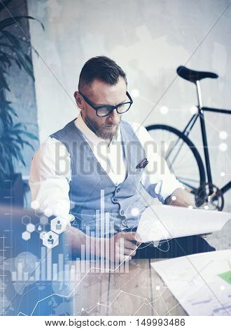 Concept Global Connection Virtual Icon Diagram Graph Interface Startup Reserch.Bearded Businessman Making Great Business Decisions.Creative Man Looking Papers Hands Table Workplace.Vertical Blurred