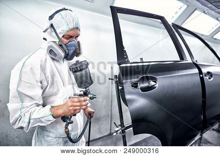 Restoration Painting Of A Black Car In The Service Center.