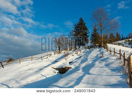 Winter  Morning Scenery Picturesque Mountain Rural Snow Covered Path And Footprint (ukraine, Carpath