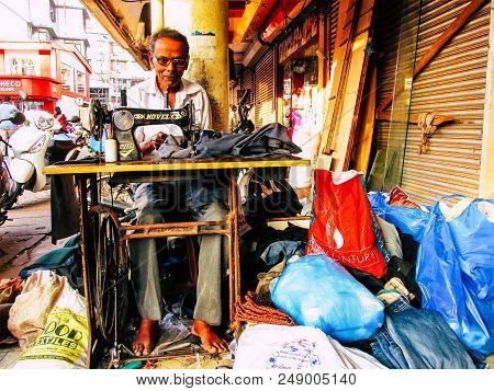 Margao Goa India December 20, 2017 View Of A Taillor Working In The Street Of Margao In The Morning