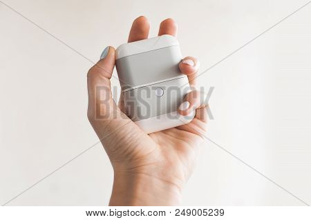 White True Wireless Earphones With Charging Case Isolated On White Background. New Technology Sport 