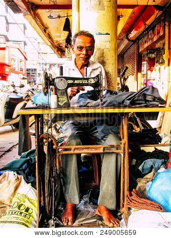 Margao Goa India December 20, 2017 View Of A Taillor Working In The Street Of Margao In The Morning