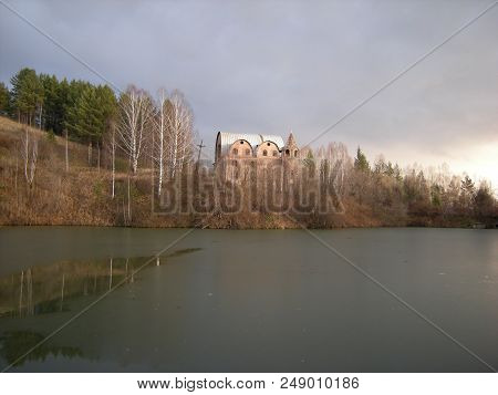 The Ice On Lake And Forest Mountens