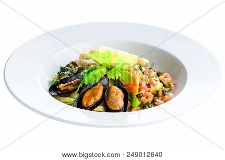 Fresh Seafood Salad With Prepapred Clams, Shrimp And Lemon In A White Plate Isolated On White Backgr