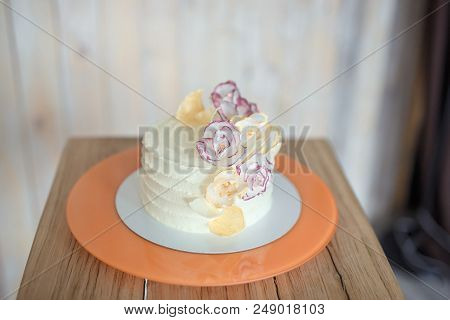 White Sponge Cake On Wooden Bright Table