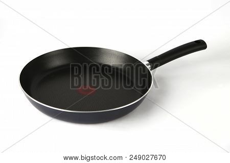 An Aluminum Pan With A Non-stick Coating On A White Background.