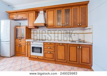 Moscow, Russia - June 30, 2018: Wooden Furniture Inside The New Kitchen.