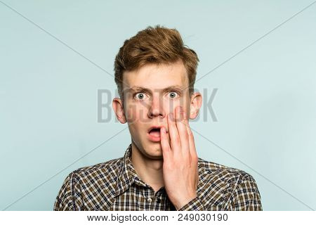 Omg Unbelievable Shock Amazement. Dumbfounded Man With Open Mouth. Portrait Of A Young Guy On Light 