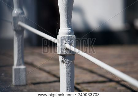 White Painted Decorative Wrought Iron Railing. Romantic Atmosphere Details Of Traditional Craftsmans