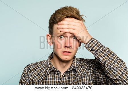 Omg Unbelievable Shock Amazement. Dumbfounded Man With Open Mouth Clutching His Head. Portrait Of A 