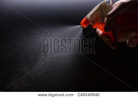 Spray With A Water Jet Close-up On A Black Background