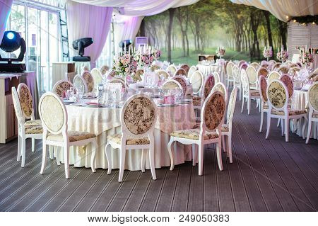 The Banquet Hall With Round Tables