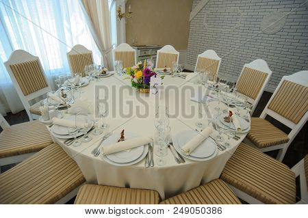 The Banquet Hall With Round Tables