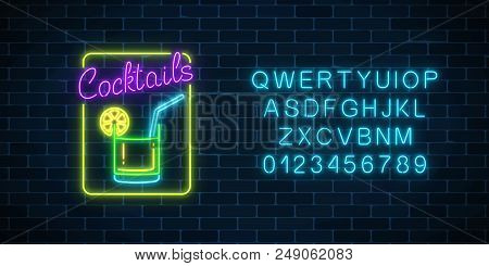 Glow Neon Alphabet And Symbol Of Cocktails Bar On Brick Wall Background. Glowing Gas Advertising Wit