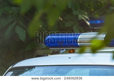 Blue Siren Flasher On The Police Car. Flash Light And Siren On The Emergency Car. Police Signal