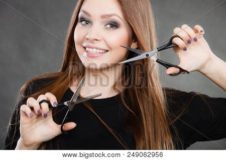 Professional Elegant Female Barber With Scissors.