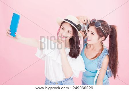 Two Beauty Woman Selfie Happily With Travel Concept On The Pink Background
