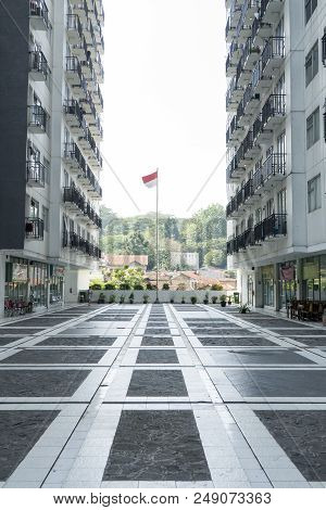 Indonesia Flag At Apartment Building Skyscrapper Tower In The City