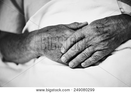 Hands of a sick old man