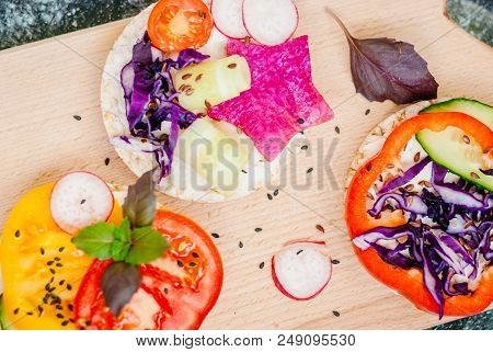 Open Sandwiches Of Rice Cakes With Cream Cheese , Vegetables, Healthy Breakfast