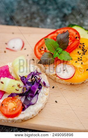 Open Sandwiches Of Rice Cakes With Cream Cheese , Vegetables, Healthy Breakfast