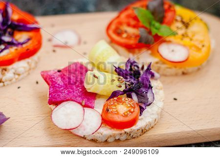 Open Sandwiches Of Rice Cakes With Cream Cheese , Vegetables, Healthy Breakfast