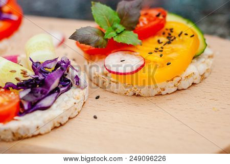 Open Sandwiches Of Rice Cakes With Cream Cheese , Vegetables, Healthy Breakfast