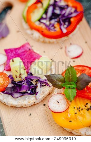 Open Sandwiches Of Rice Cakes With Cream Cheese , Vegetables, Healthy Breakfast
