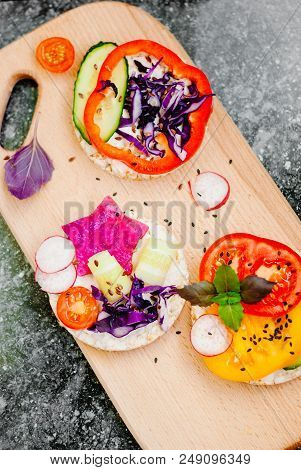 Open Sandwiches Of Rice Cakes With Cream Cheese , Vegetables, Healthy Breakfast
