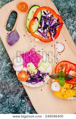 Open Sandwiches Of Rice Cakes With Cream Cheese , Vegetables, Healthy Breakfast