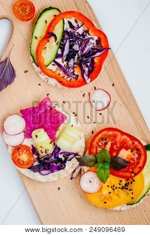 Open Sandwiches Of Rice Cakes With Cream Cheese , Vegetables, Healthy Breakfast