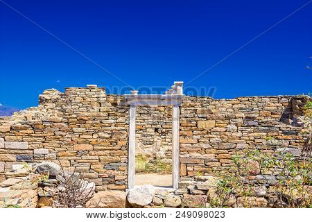 Ancient Ruins In The Island Of Delos In Cyclades, One Of The Most Important Mythological, Historical