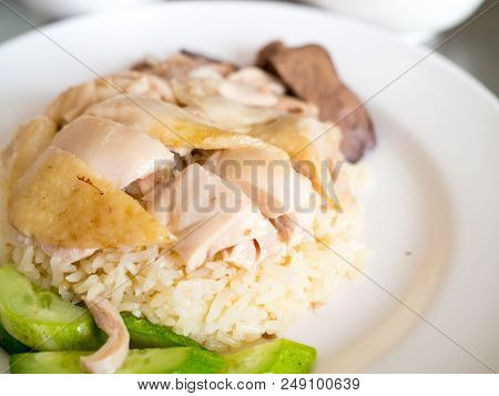 Hainanese Chicken Rice With Cucumber On A Plate