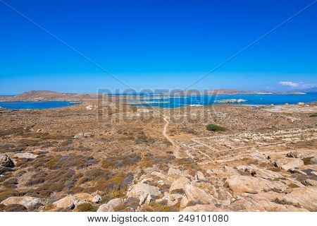 Ancient Ruins In The Island Of Delos In Cyclades, One Of The Most Important Mythological, Historical