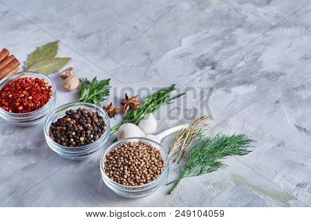 Three Glass Bowls With Spices Arranged In Rows On White Textured Background, View From Above, Select