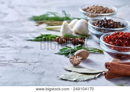 Three Glass Bowls With Spices Arranged In Rows On White Textured Background, View From Above, Select
