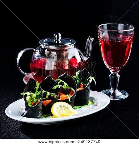 Russin Cuisine In Modern Form. Homemade Black Pancakes Blini With Cuttlefish Ink Served With Salmon 