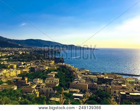 View Of The Roofs Of The Houses, The Sea And The Mountains In The Bay