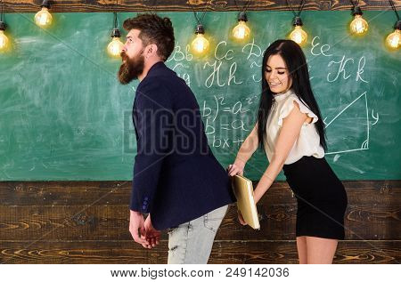 Girl On Smiling Face Having Fun While Punishes Teacher. Student Lady Slapping On Teachers Buttocks W
