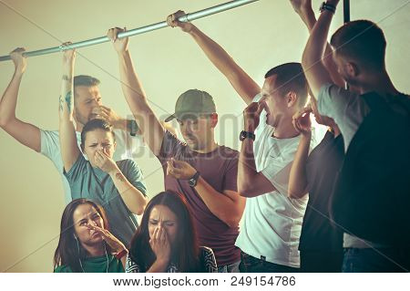 Smell Of Sweat. Sweaty Armpits. Man In Bus Or Public Transport. The Unhappy People Near Man. Hyperhi
