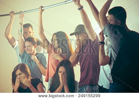 Smell Of Sweat. Sweaty Armpits. Man In Bus Or Public Transport. The Unhappy People Near Man. Hyperhi
