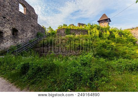The Tower And Ruins Of The Walls Of A Mighty Nevytsky Castle In Transcarpathia