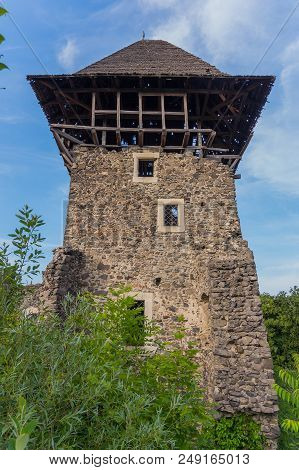 Partially Restored Tower Of A Magnificent Neviitskogo Castle On A Mountain Near The River Tisza. Uzh