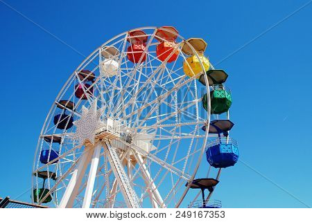 BARCELONA, SPAIN - APRIL 18, 2018: The ferris wheel at the Tibidabo amusement park on Mount Tibidabo. Activities at the park first started in 1901.