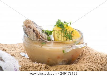 Vegetable Soup With Fish In A Glass Bowl On A White Background