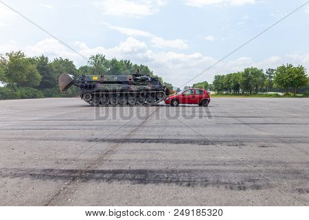 Feldkirchen / Germany - June 9, 2018: German Tank Dozer Dachs Crashes A Red Car On Day Of The Bundes