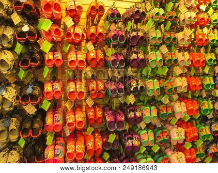 Tampa, Usa - May 10, 2018: Rack With Lots Of Pairs Of Childrens Soft Rubber Sandals Or Crocs In Vari