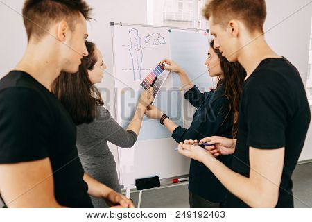 Coworkers Discussion, Creative Team Communication. Group Of Young Modern People In Smart Casual Wear