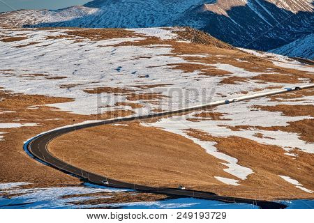Trail Ridge Road, the highest (12,183 feet) continuous highway in the USA in high alpine tundra with rocks and mountains at autumn. Rocky Mountain National Park in Colorado, USA. 