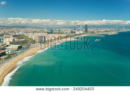 Aerial View Of Barcelona, Barceloneta Beach And Mediterranean Sea In Summer Day At Barcelona, Spain.